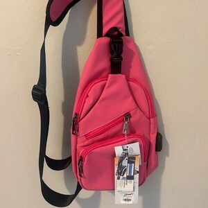 Pink anti-theft sling crossbody with USB port